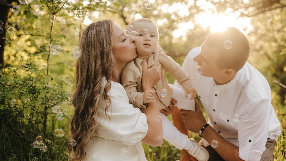 a person holding a baby